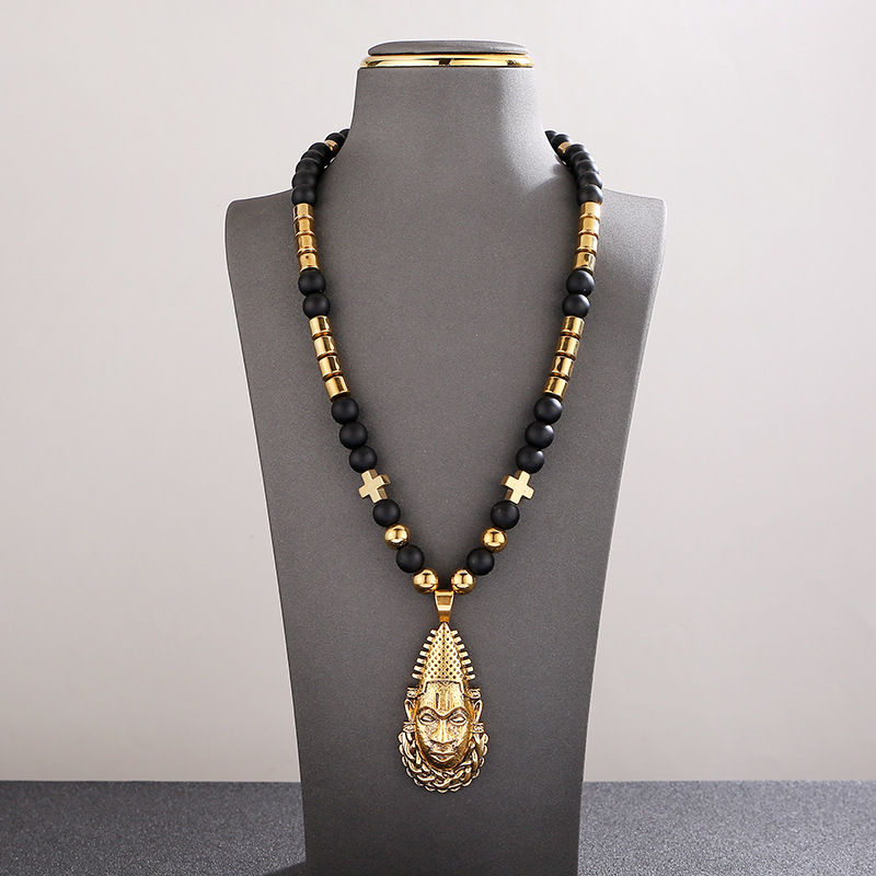 Masked Pendant Black & Gold beaded Necklace